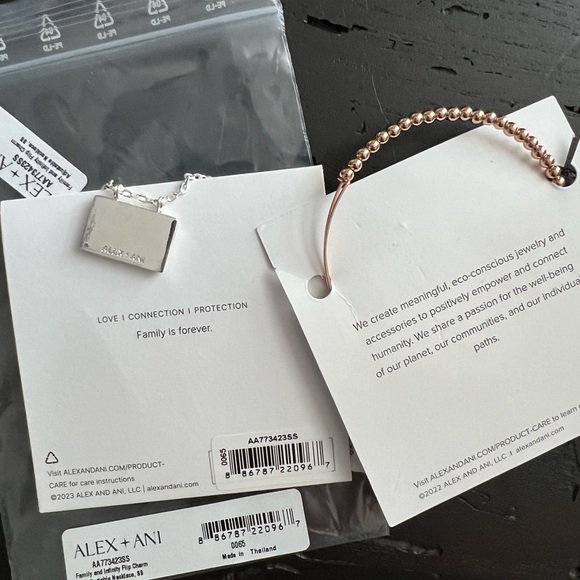 Alex and Ani Family & Infinity Flip Charm
Necklace & Dot Beaded Bracelet - Picture 5 of 9